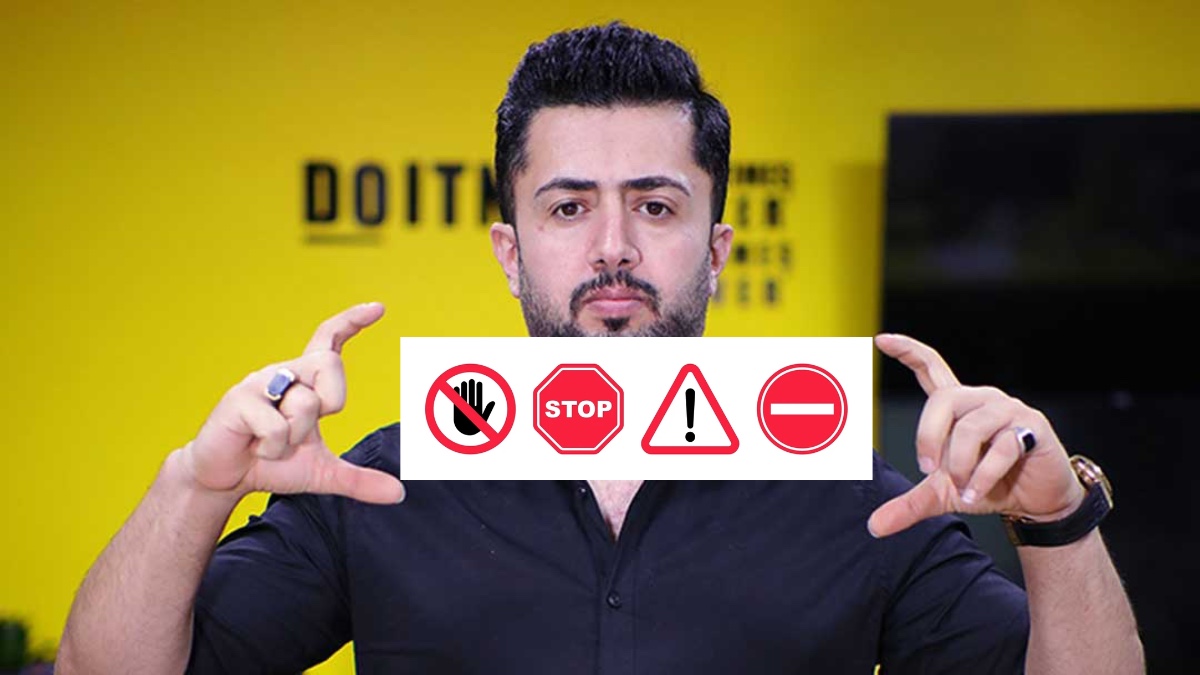 معین فرجی در حال نشان دادن علائم ممنوعه برای آنلاین‌شاپ‌های اینستاگرامی